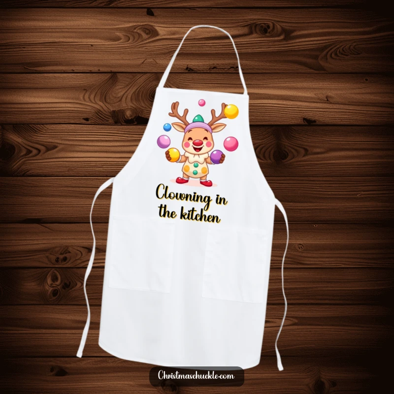 Funny apron showing a smiling reindeer clown juggling brightly colored balls, perfect for adding festive fun to kitchen activities.