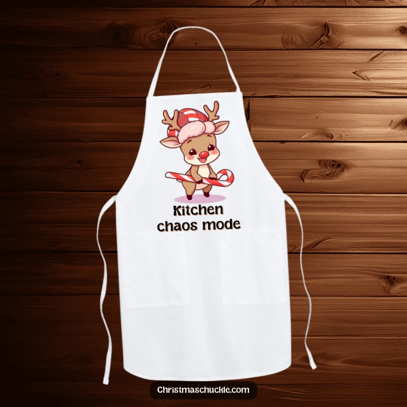 Funny apron featuring a happy reindeer wearing a clown wig, comically tripping over a candy cane, for festive cooking.