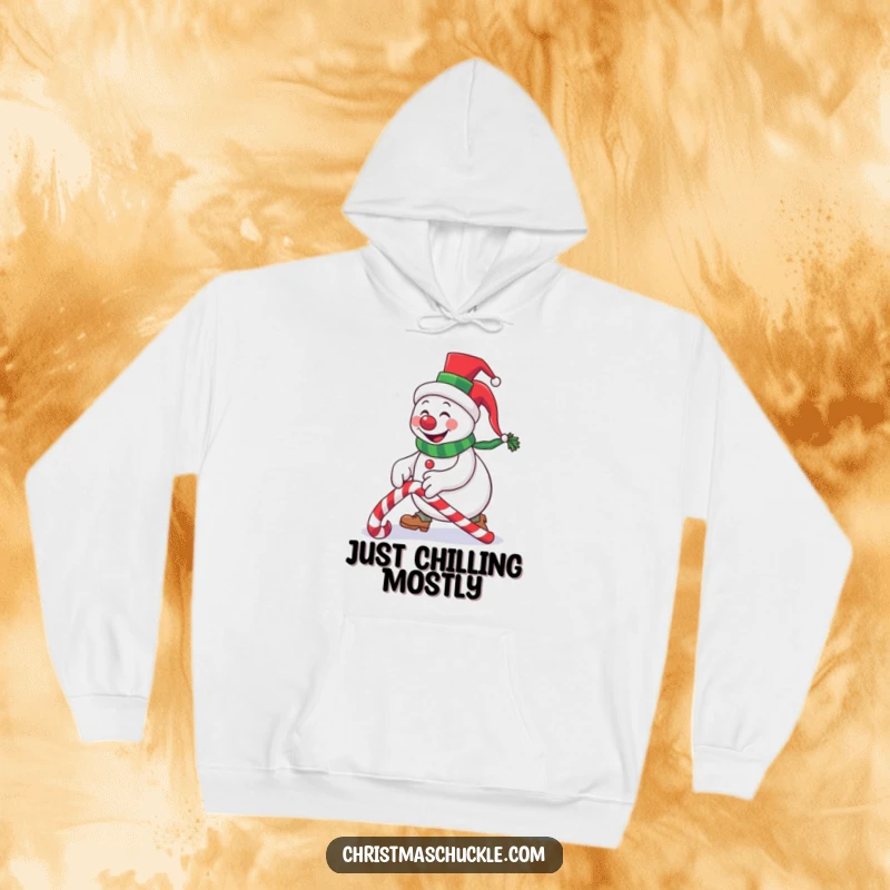 Funny snowman clown wearing a small top hat stumbling over a candy cane, a warm and humorous hoodie for winter holiday occasions.
