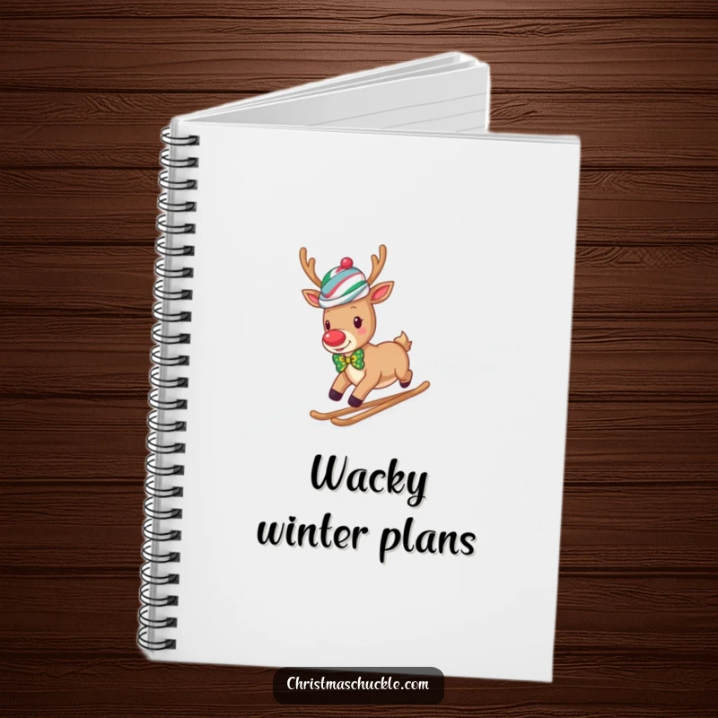 Funny reindeer clown in a wig and bow tie slides down a snowy hill, a humorous notebook for writing.