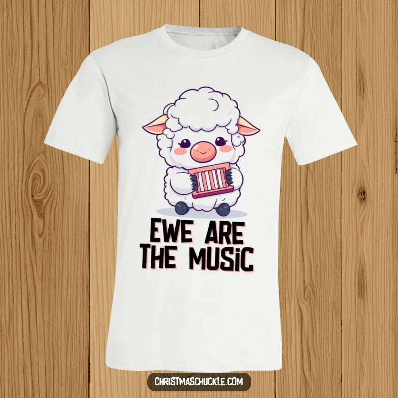 Funny t-shirt featuring a fluffy sheep character wearing a clown nose and playing a concertina with great enthusiasm.