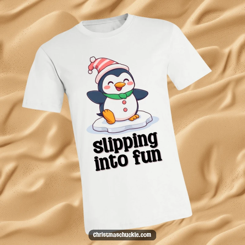 Funny t-shirt featuring a smiling penguin dressed as a clown, comically slipping on an icy patch, perfect for humorous wear.