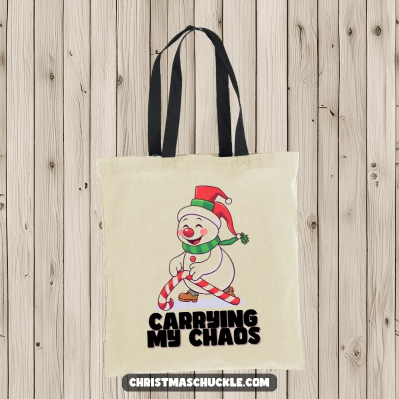 Funny snowman clown in a tiny top hat tripping over a candy cane, a humorous tote bag for carrying groceries or holiday treats.