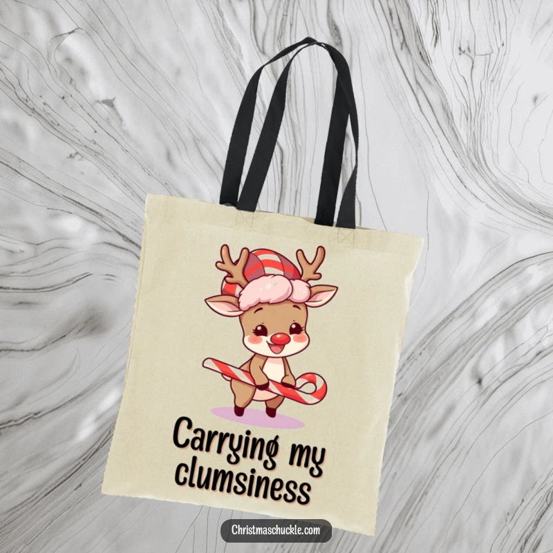 Funny tote bag featuring a happy reindeer in a clown wig, hilariously tripping over a candy cane, perfect for holiday shopping.