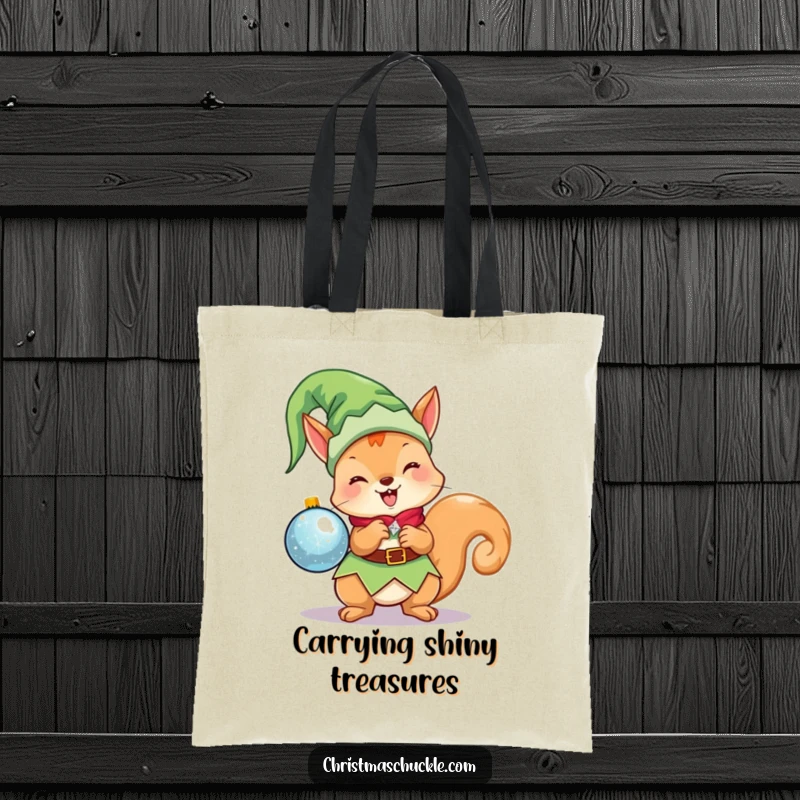 Funny Kawaii Elf Squirrel Tote Bag: A cute Christmas character as an elf, excitedly holding a sparkling ornament, ideal for shopping.