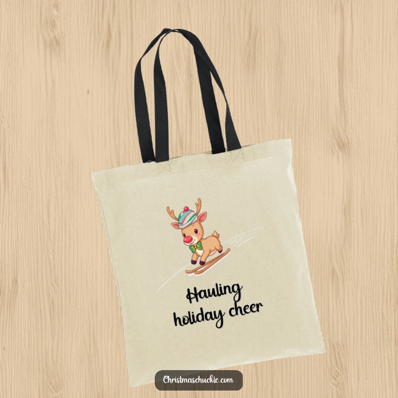 Funny reindeer clown in a wig and bow tie slides down a snowy hill, a humorous tote bag design.